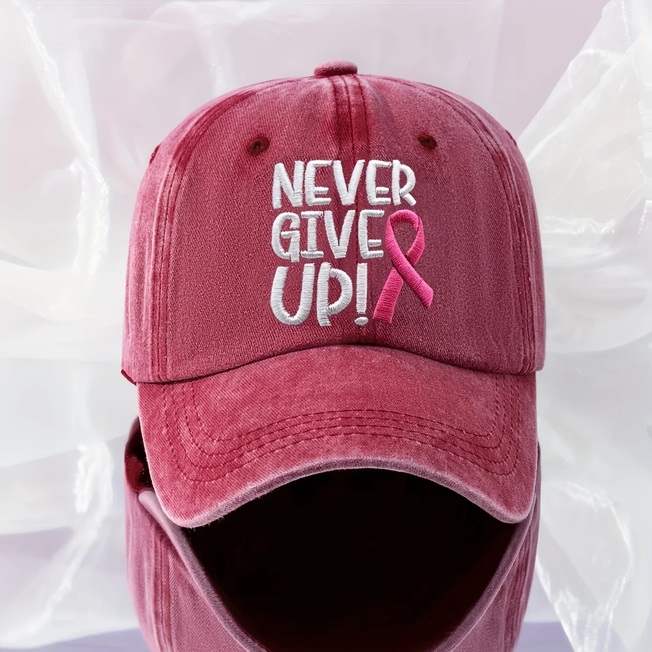 A Pink Ribbon Embroidered Baseball Cap Breast Cancer Awareness, Featuring a 'Never Give Up' Message, Designed for